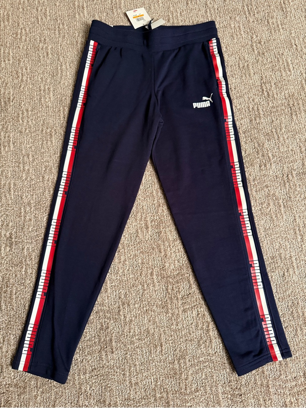 PUMA Tapered Track Pants with Red Stripe